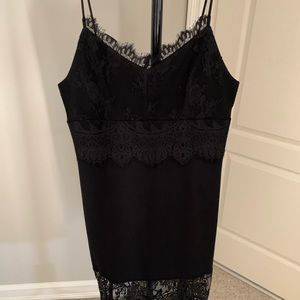 Black dress with lace  detailing top and bottom